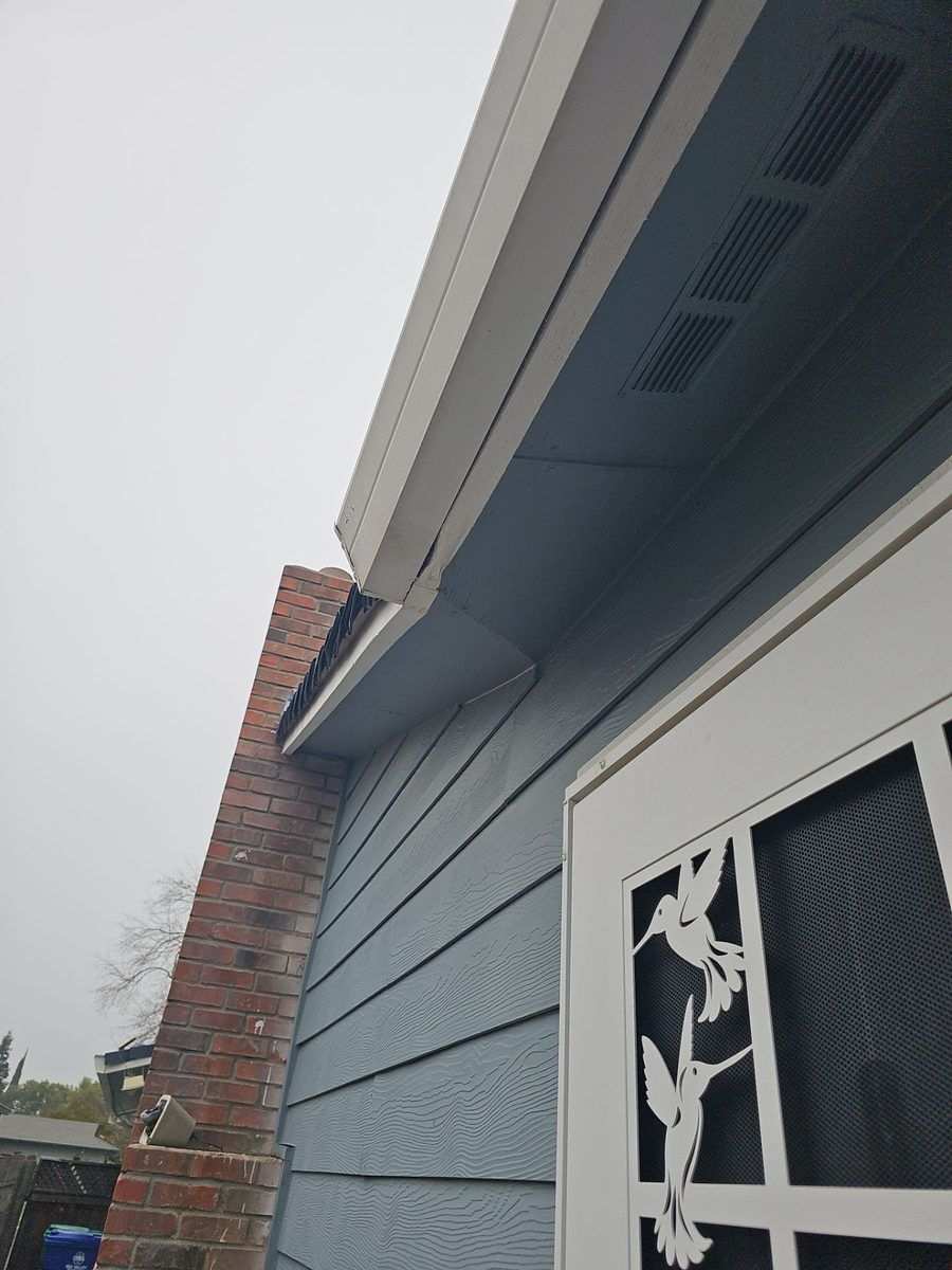 Hidden 2x6 dry rot at the soffit-fascia transition, exposed during the Atwater tear-off