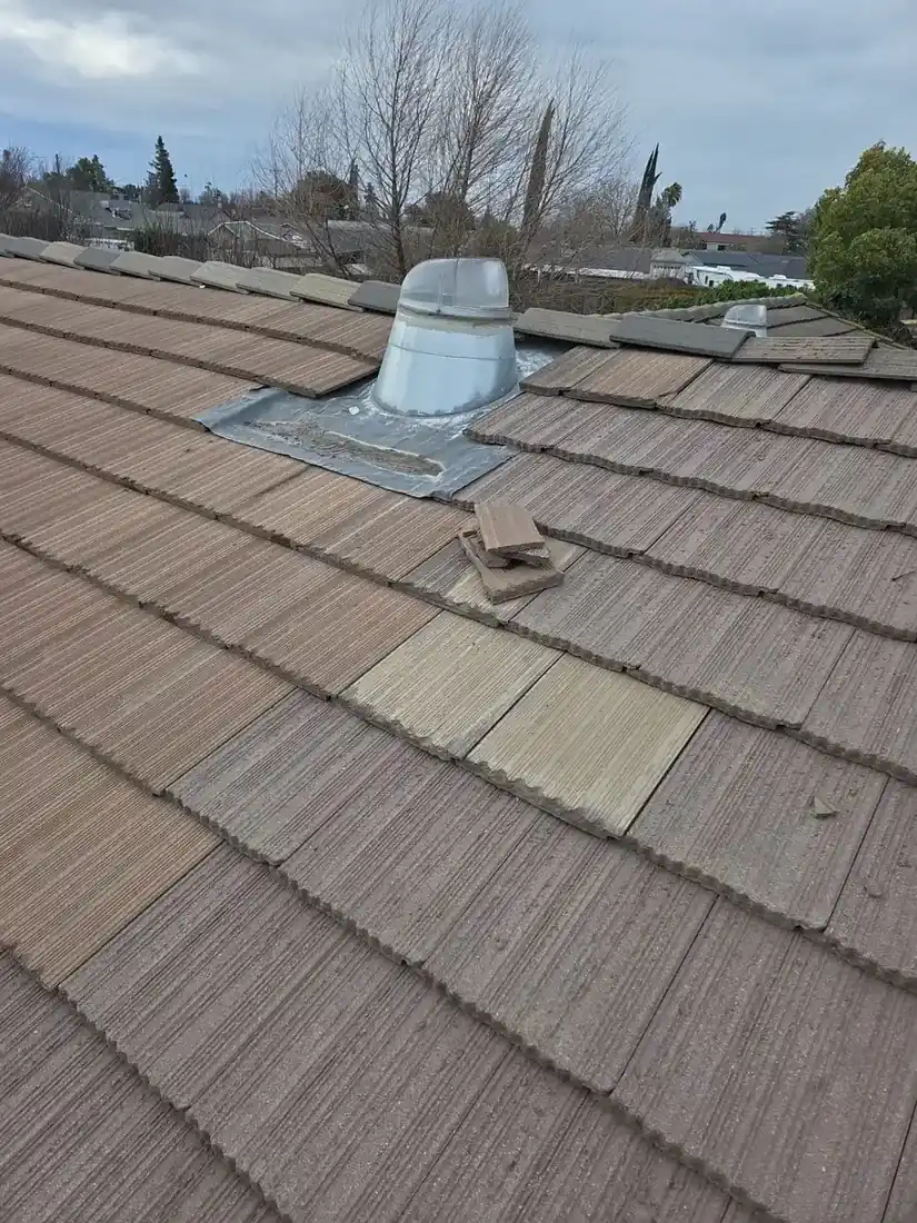 Hilmar tile roof after repair — restored, properly seated roof tiles