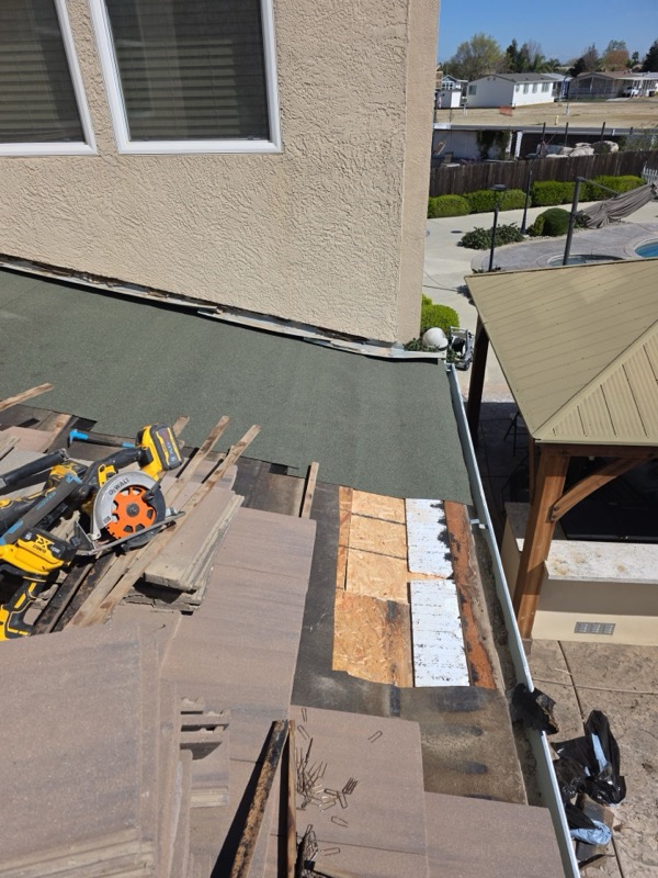 New underlayment over repaired decking at roof edge