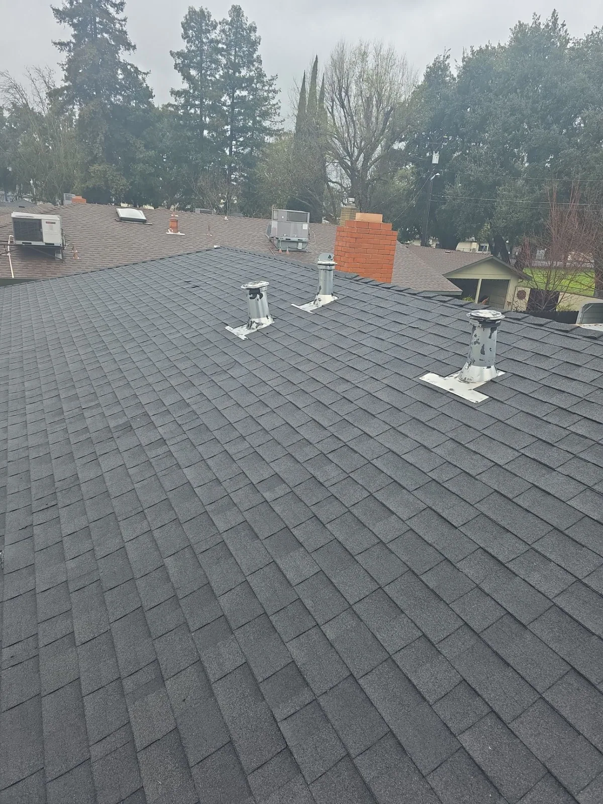 Drone view of the completed Charles Pl re-roof, Turlock